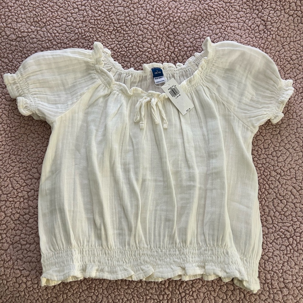 Girls size 10/12. Brand new w tags.